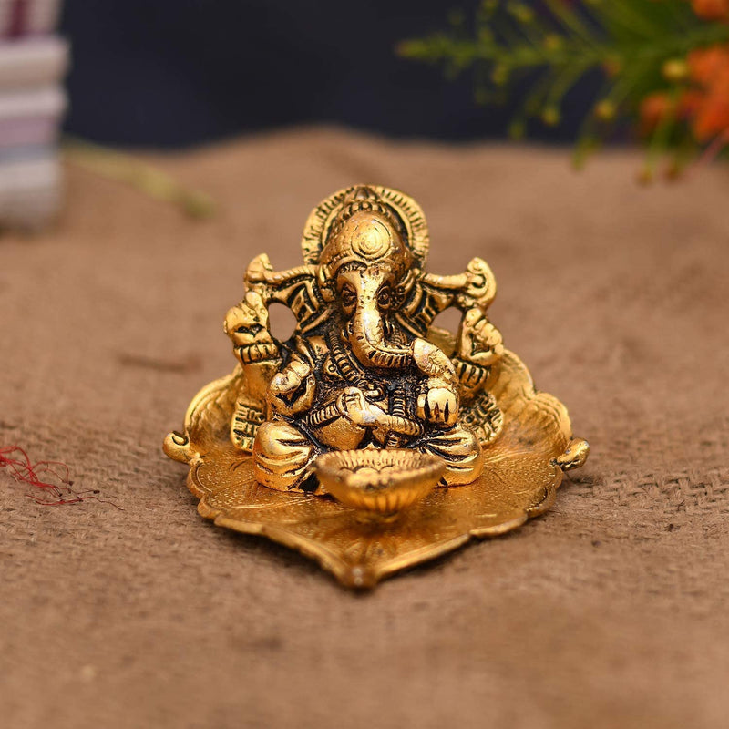 Bengalen Ganesha on Leaf Statue Ganesh Idol with Diya for Home Decorative Gifts Puja Diwali Gift Items